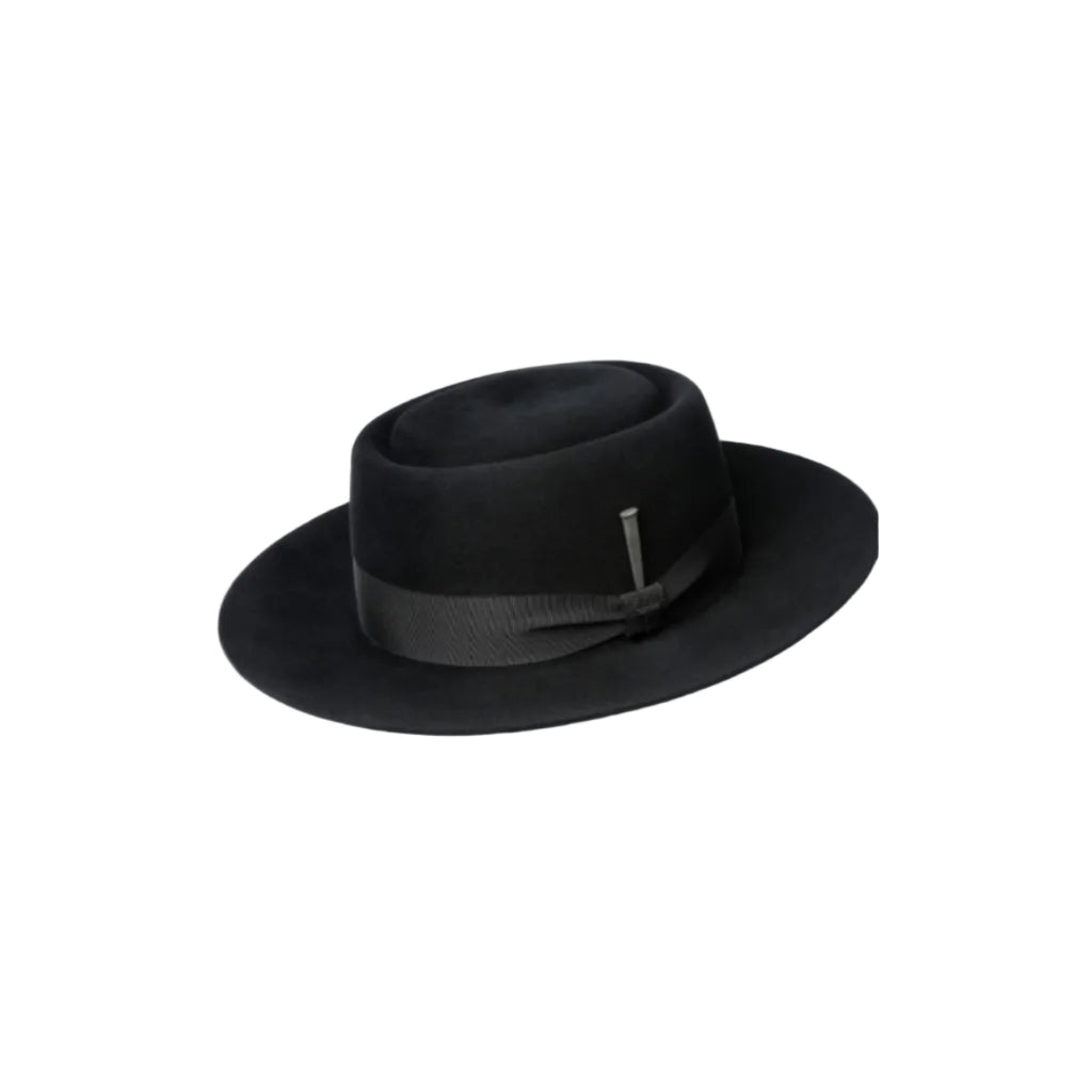 A black felt bolero-style hat with a matching black ribbon band and a small silver metal pin accent, shown on a plain white background.