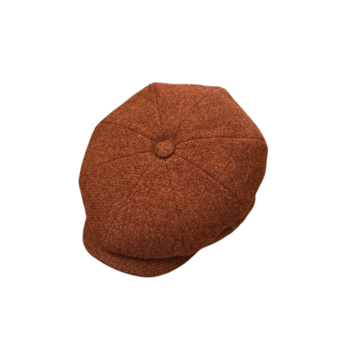 A classic eight-panel flat cap in a textured rust-brown tweed fabric, shown from a top-down perspective on a solid white background.