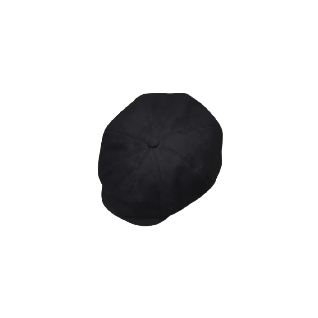 A black structured newsboy cap shown from a top-down view against a plain white background.