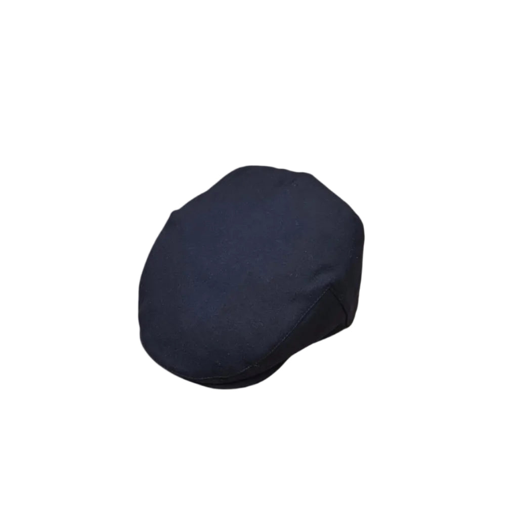 A dark navy blue flat cap shown from a three-quarters perspective on a plain white background.